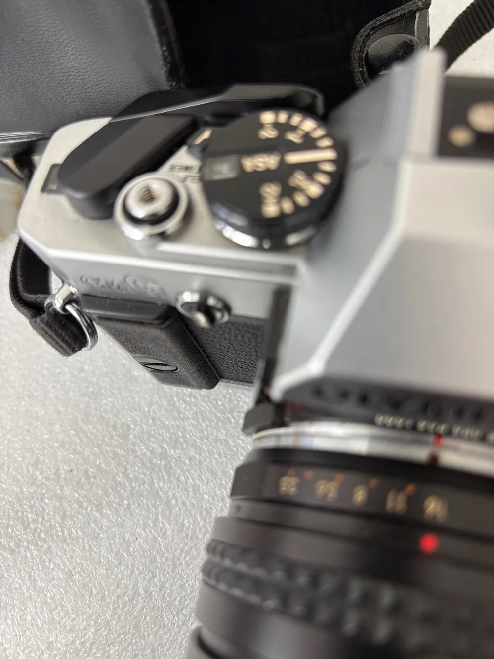 Olympus Silver and Black 35mm SLR Camera with Black Zoom Lens parts not tested